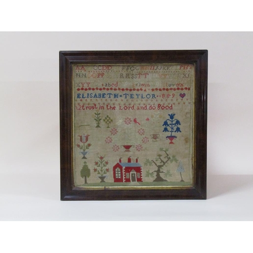 205 - A 19c needlework alphabetical sampler with verse and a panel featuring a chapel surrounded by trees ... 