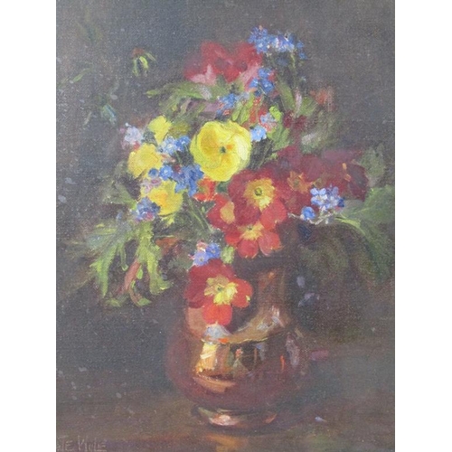 243 - Kate Wylie - A vase of spring flowers, signed, oil on  canvas on board, framed, 27cm x 22cm.