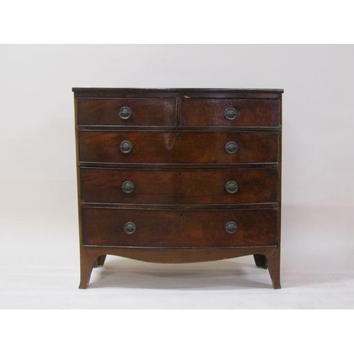 249 - A late Georgian mahogany bow front chest of two short and three long graduated drawers on splayed br... 