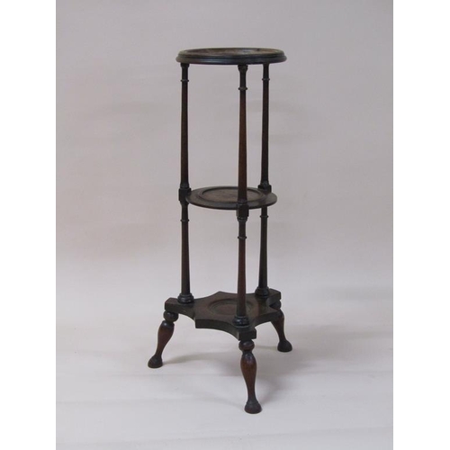 255 - An early 19c three tier wash stand with spindle supports and short baluster legs with paw feet, 76cm... 