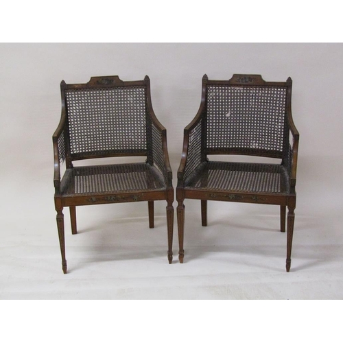 273 - A pair of Regency period painted and caned armchairs with rear swept legs and straight square taperi... 