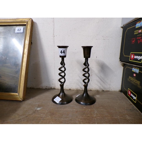 44 - PAIR OF PATINATED BRONZE METAL BARLEY TWIST CANDLESTICKS