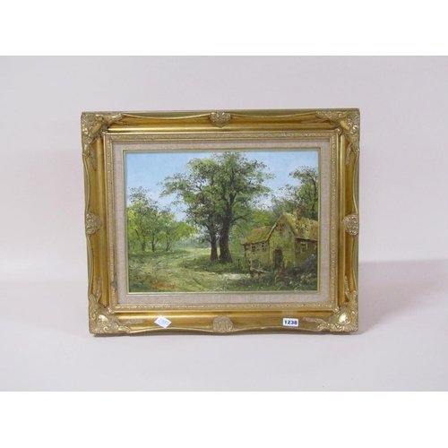 1238 - C ROBERT - COTTAGE IN A WOODLAND SETTING, SIGNED OIL ON BOARD, FRAMED, 30CM X 40CM