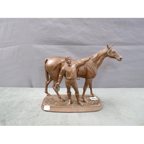 1415 - PATINATED METAL FIGURE GROUP OF HORSE AND JOCKEY, 31CM W