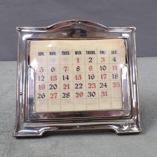SILVER CASED DESK STAND CALENDAR