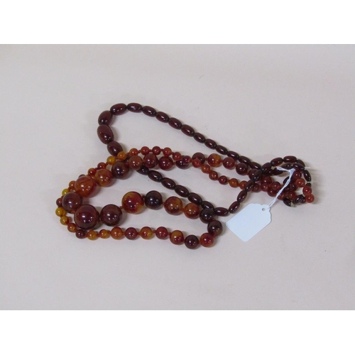 1525 - TWO STRINGS OF AMBER LIKE BEADS