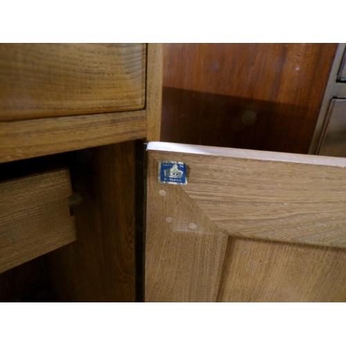 2015 - ERCOL SIDEBOARD FITTED TWO FRIEZE DRAWERS OVER CUPBOARD