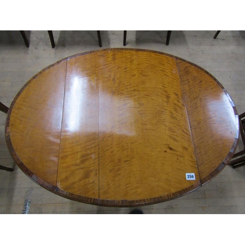 256 - A Regency period satinwood oval Pembroke type table, crossbanded and line inlaid, fitted one end dra... 