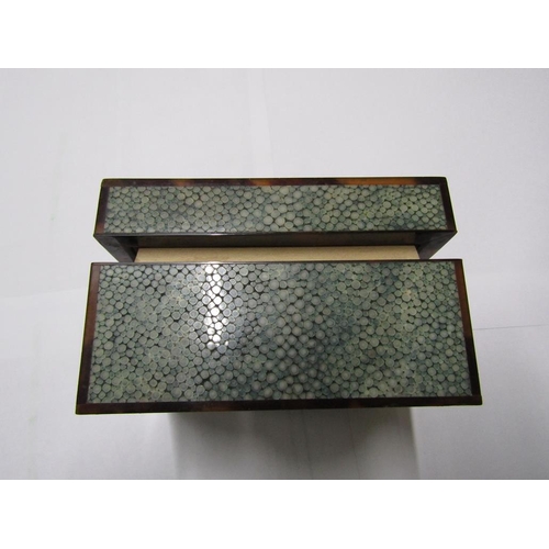 99 - An early 20c shagreen and tortoiseshell cigarette box with an agate stone mount, 12cm w, 6.5cm h.