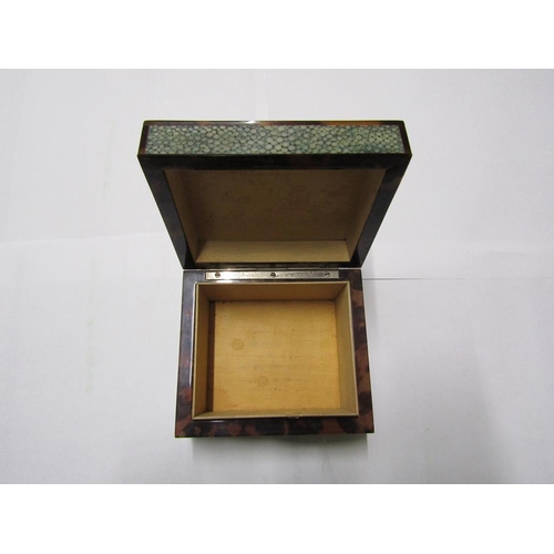 99 - An early 20c shagreen and tortoiseshell cigarette box with an agate stone mount, 12cm w, 6.5cm h.