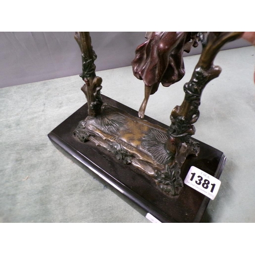 1381 - PATINATED BRONZED METAL FIGURE OF A GIRL IN SWING ON MARBLE BASE, 30CM H