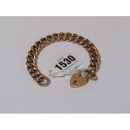 1530 - 9ct GOLD HEAVY LINK BRACELET WITH A HEART SHAPED PADLOCK, 26.6g