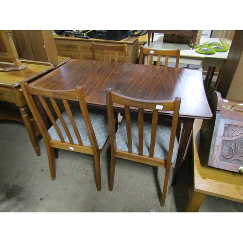 648 - TEAK EXTENDING DINING TABLE AND FOUR CHAIRS