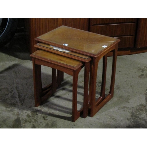 649 - NEST OF THREE TEAK TABLES