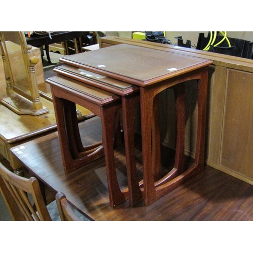 649 - NEST OF THREE TEAK TABLES