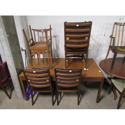 696 - TEAK EXTENDING DINING TABLE AND CHAIRS