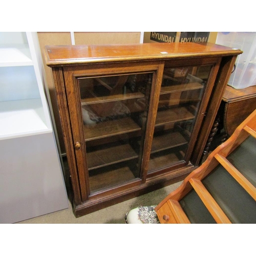 887 - VICTORIAN OAK GLAZED BOOKCASE