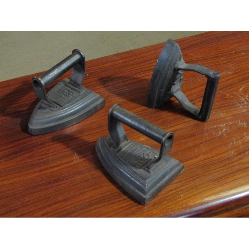 899 - BOX OF OLD IRONS