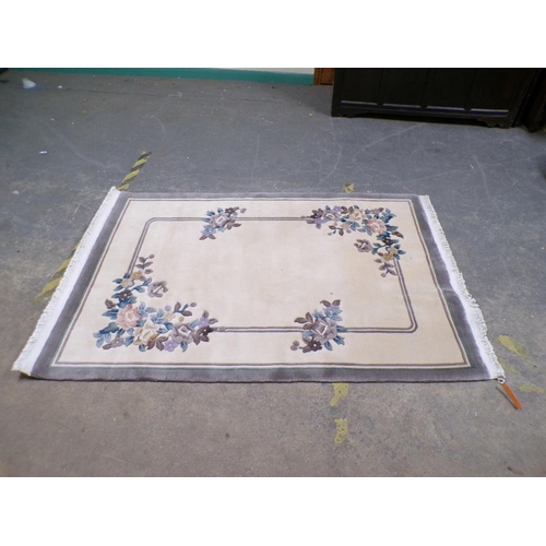 1964 - ORIENTAL IVORY GROUND RUG 123CM X 197CM