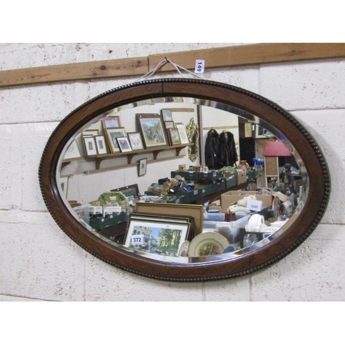 372 - OAK FRAMED BEVEL EDGE WALL MIRROR