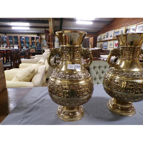 1375 - PAIR OF ORIENTAL BRASS TWO HANDLED BALUSTER VASES, EACH 42cms H