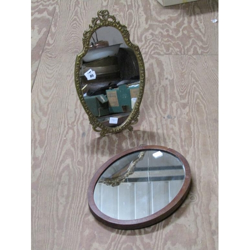 85 - GILT FRAMED WALL MIRROR; OVAL MIRROR