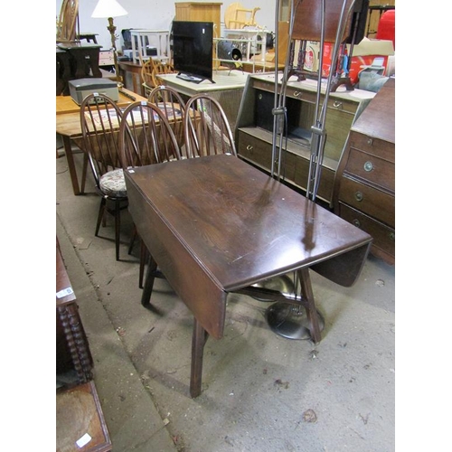 543 - ERCOL DARK OAK DROPLEAF TABLE AND FOUR CHAIRS