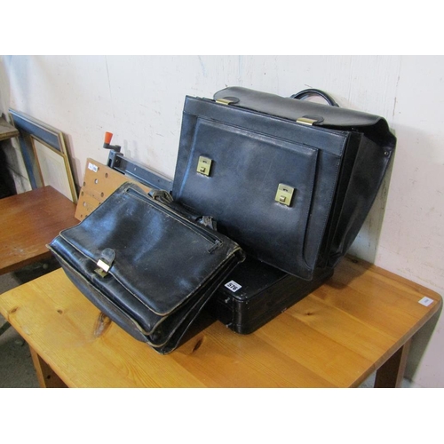 576 - BREIFCASE AND TWO LEATHER BAGS