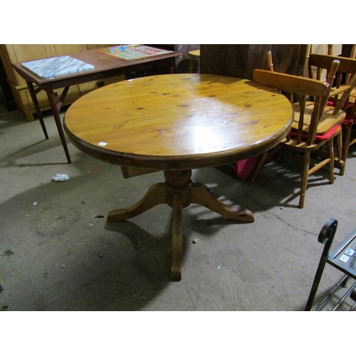 601 - DUCAL PINE CIRCULAR DINING TABLE AND FOUR CHAIRS