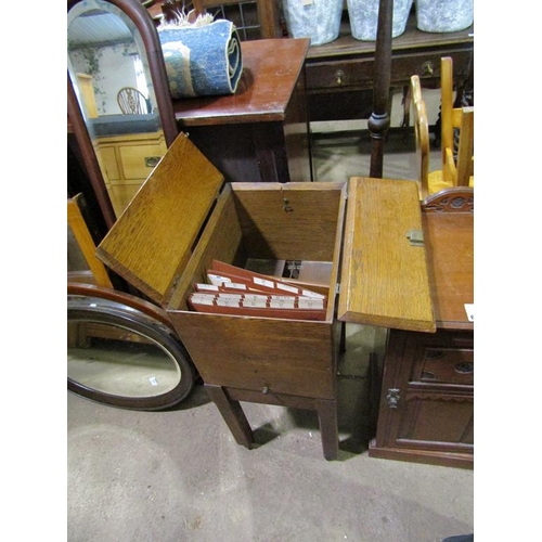 606 - 1930'S OAK LIFT TOP FILING CABINET BY AMBERY