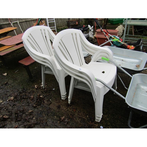 941 - SIX WHITE PLASTIC GARDEN CHAIRS