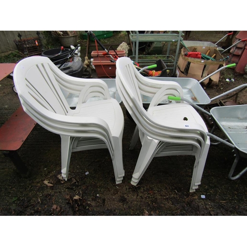 941 - SIX WHITE PLASTIC GARDEN CHAIRS