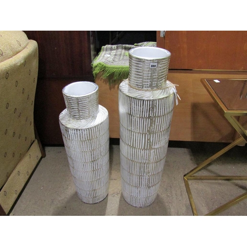 880 - TWO WHITE AND SILVER URNS