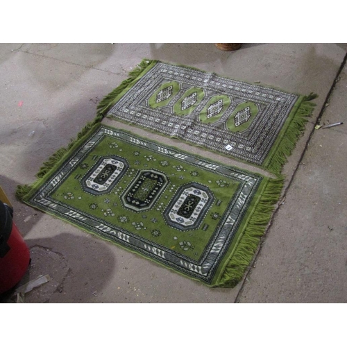 906 - PAIR OF GREEN GROUND RUGS