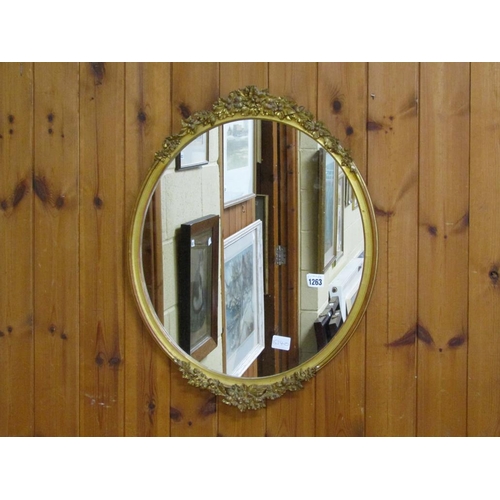 1263 - GILT FRAMED OVAL WALL MIRROR, 57CM X 45CM