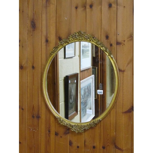 1263 - GILT FRAMED OVAL WALL MIRROR, 57CM X 45CM