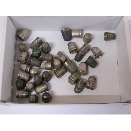 1535 - BOX OF SILVER AND OTHER THIMBLES, TREEN THIMBLE HOLDERS, PIN CUSHION WITH PINS ETC