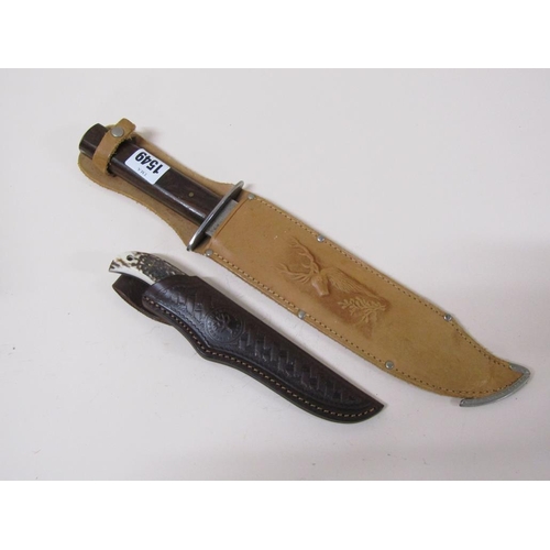 1549 - BOWIE KNIFE IN BROWN LEATHER SHEATH; BOKER HUNTING KNIFE IN LEATHER SHEATH