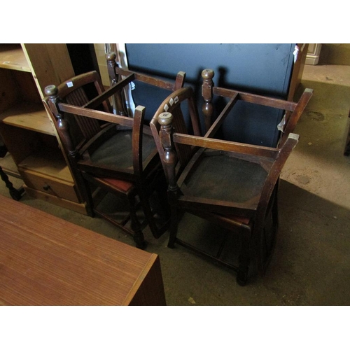 765 - FOUR 1930'S OAK DINING CHAIRS