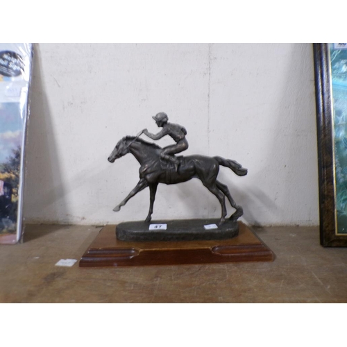 47 - BRONZED FIGURE OF A HORSE ON WOODEN STAND