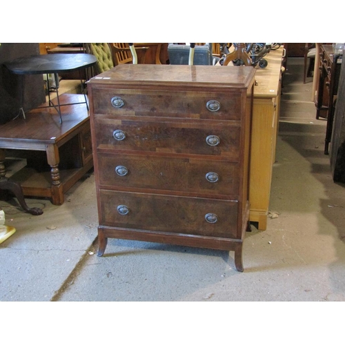 563 - WALNUT VENEERED FOUR DRAWER CHEST