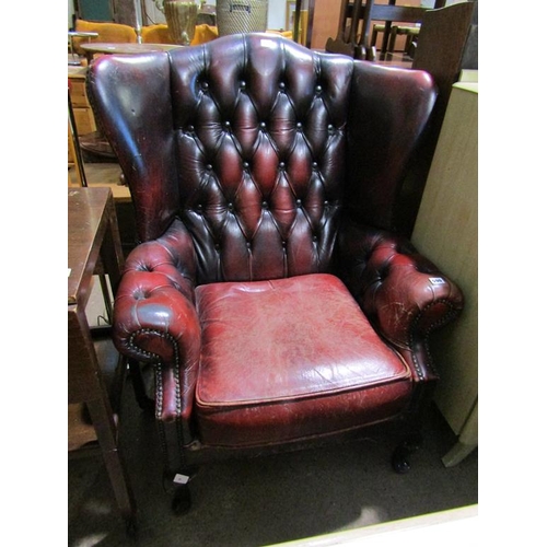 590 - LEATHER WING BACKED ARMCHAIR