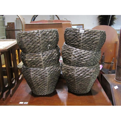 610 - SIX WICKER PLANTERS