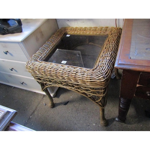 708 - WICKER AND GLASS TABLE