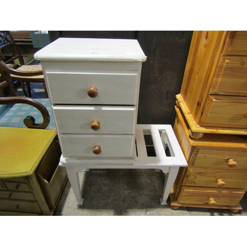 855 - LUGGAGE RACK AND A THREE DRAWER CHEST