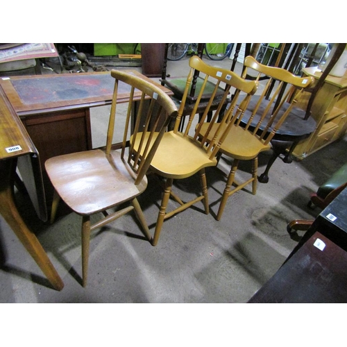 907 - THREE STICK BACK CHAIRS TO INCL ERCOL