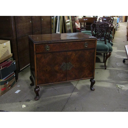 953 - WALNUT VENEERED TWO DOOR CUPBOARD