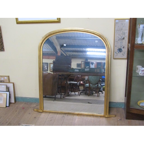 1213 - GILT WOOD AND STUCCO ARCHED OVAL MANTEL MIRROR, 136CM X 114CM