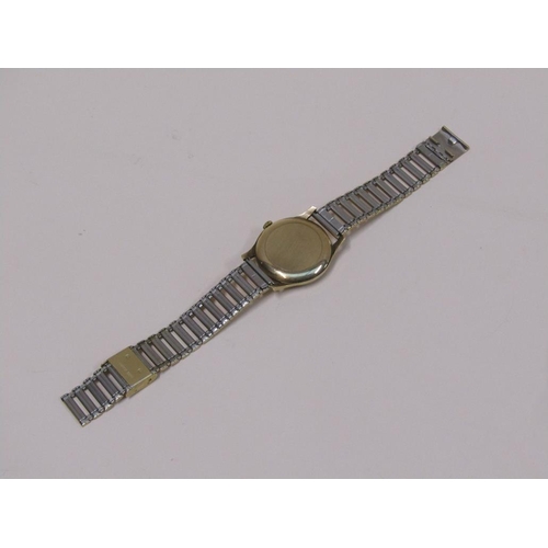 1492 - 9ct GOLD GARRARD GENTS WATCH WITH PLATED STRAP IN ORIGINAL BOX WITH SERVICE RECEIPT