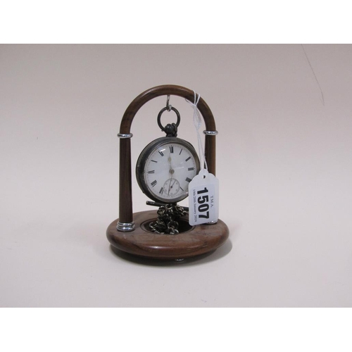 1507 - EDWARDIAN SILVER POCKET WATCH AND SILVER ALBERT CHAIN HANGING ON WOODEN WATCH STAND